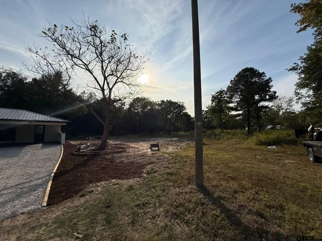 a view of an outdoor space with swimming pool