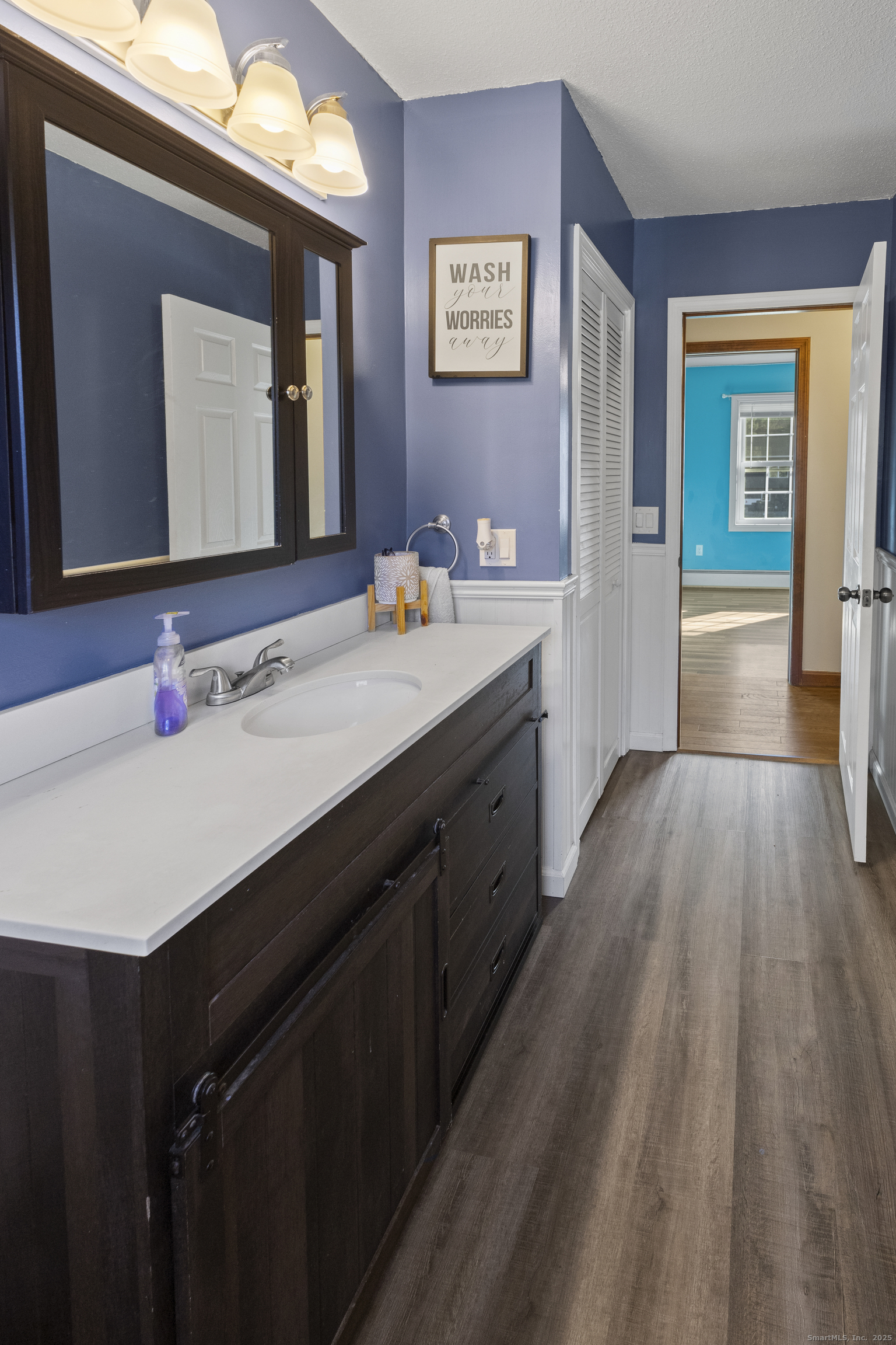 230 Cemetery Road Plainfield, CT 06374 - Photo 19 of 29 a bathroom with a sink vanity and a mirror