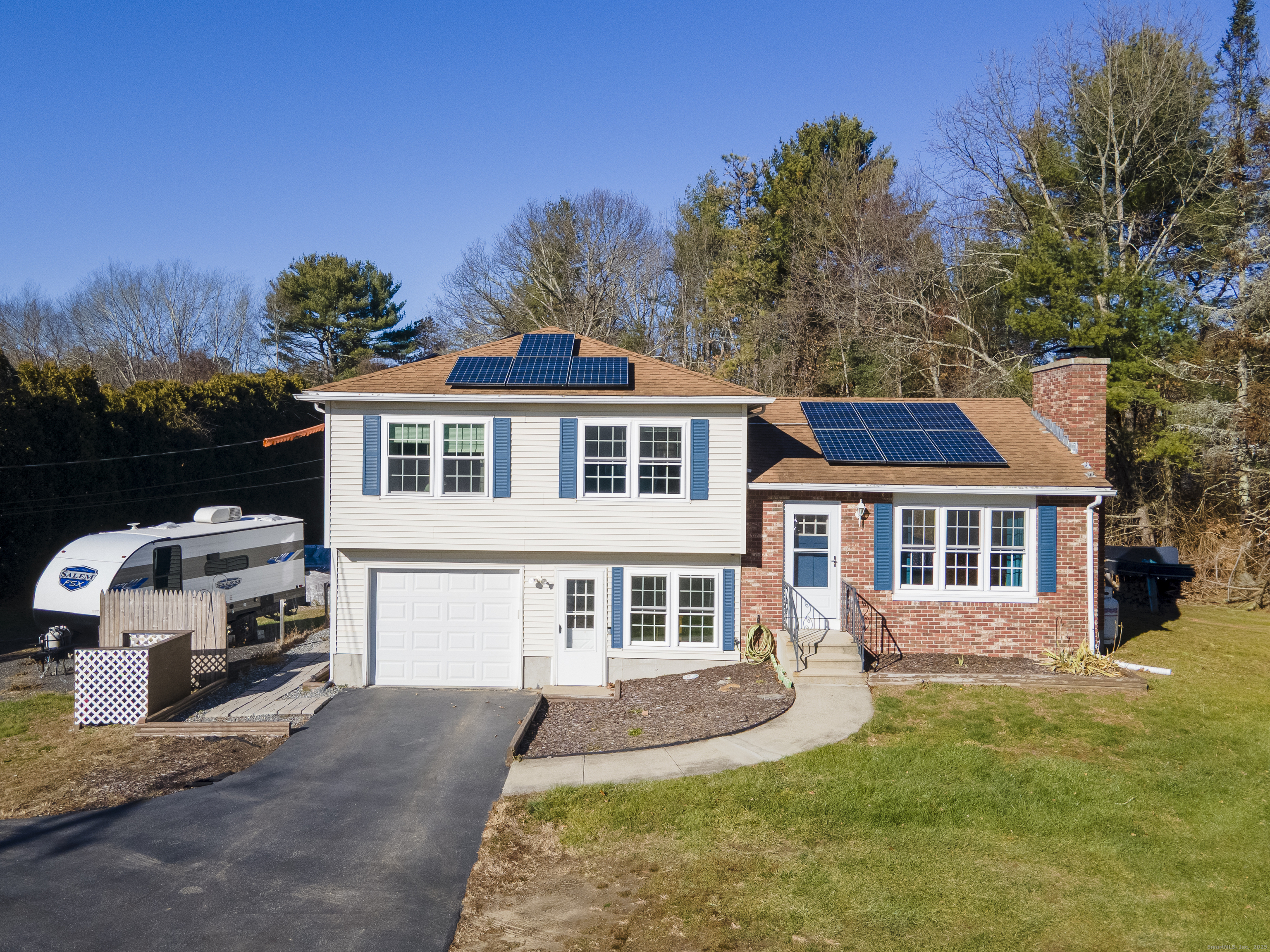 230 Cemetery Road Plainfield, CT 06374 - Photo 2 of 29 a front view of a house with a yard