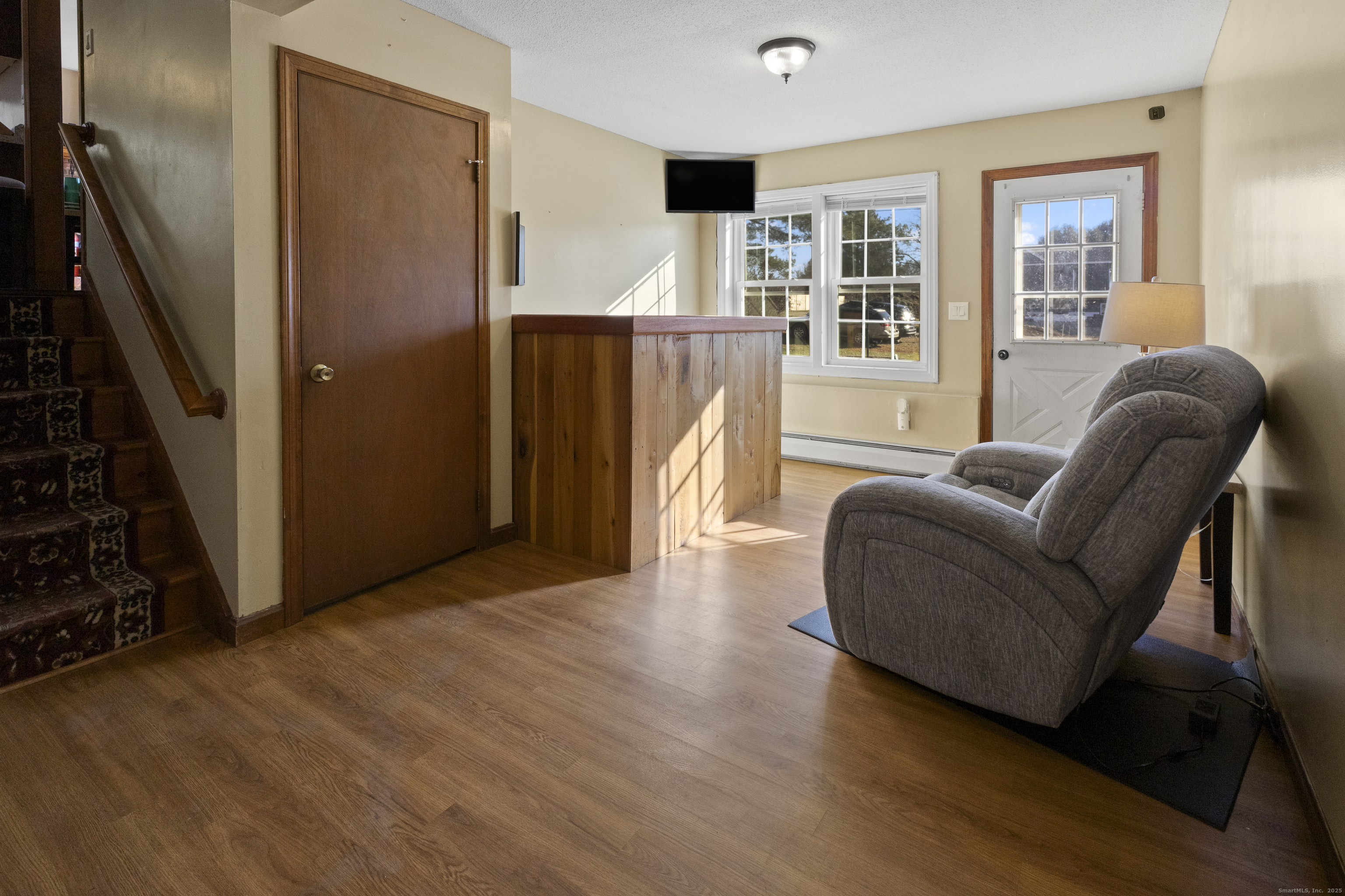 230 Cemetery Road Plainfield, CT 06374 - Photo 25 of 29 a living room with furniture and a wooden floor