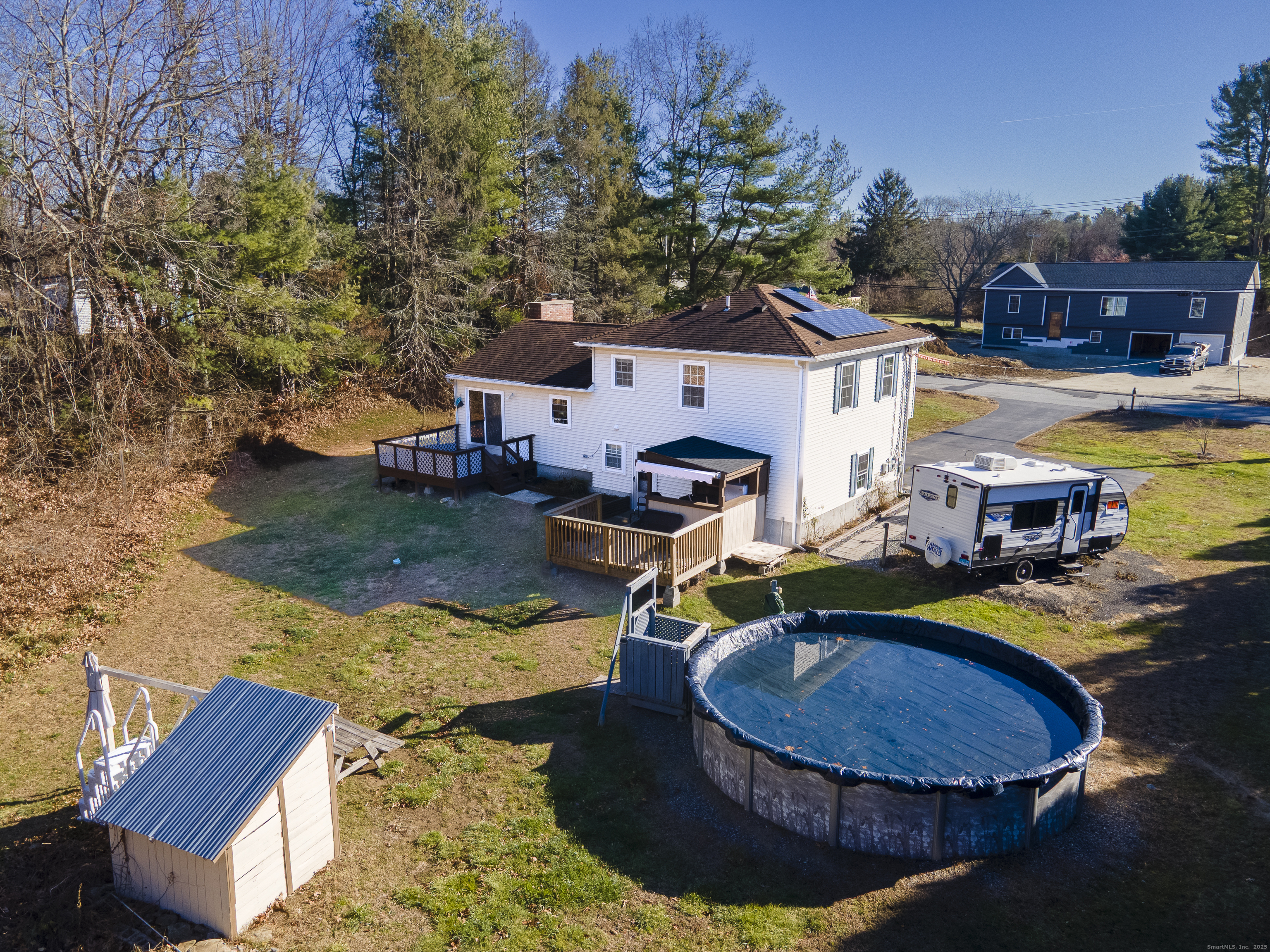 230 Cemetery Road Plainfield, CT 06374 - Photo 3 of 29 an aerial view of a house with swimming pool and trees
