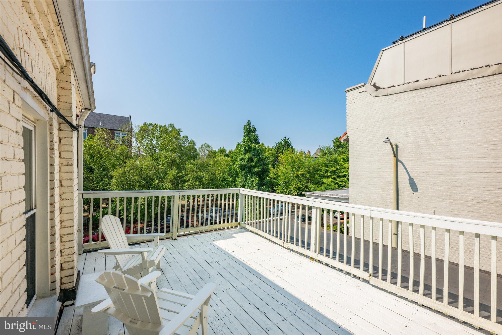 1124 E Street Northeast, Unit A Washington, DC 20002 - Photo 9 of 10 a view of balcony with wooden floor and outdoor seating