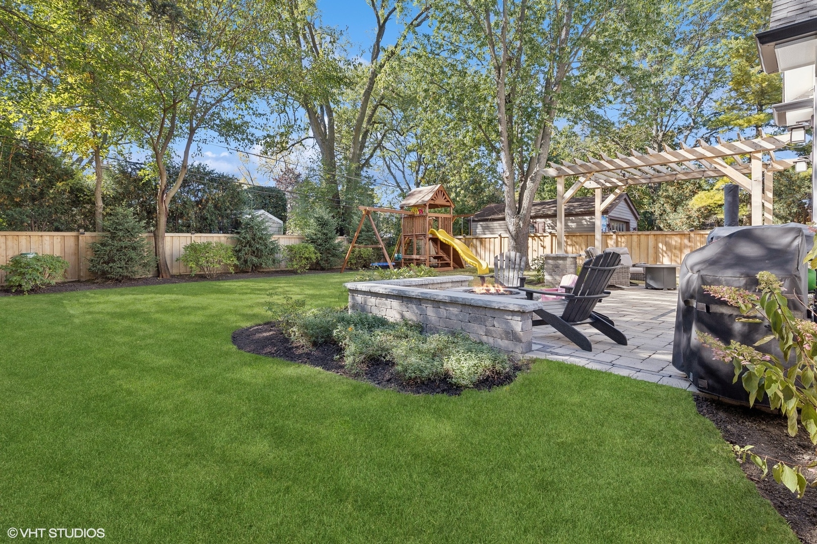 2425 Illinois Road Northbrook, IL 60062 - Photo 46 of 59 a view of backyard with slide and bench