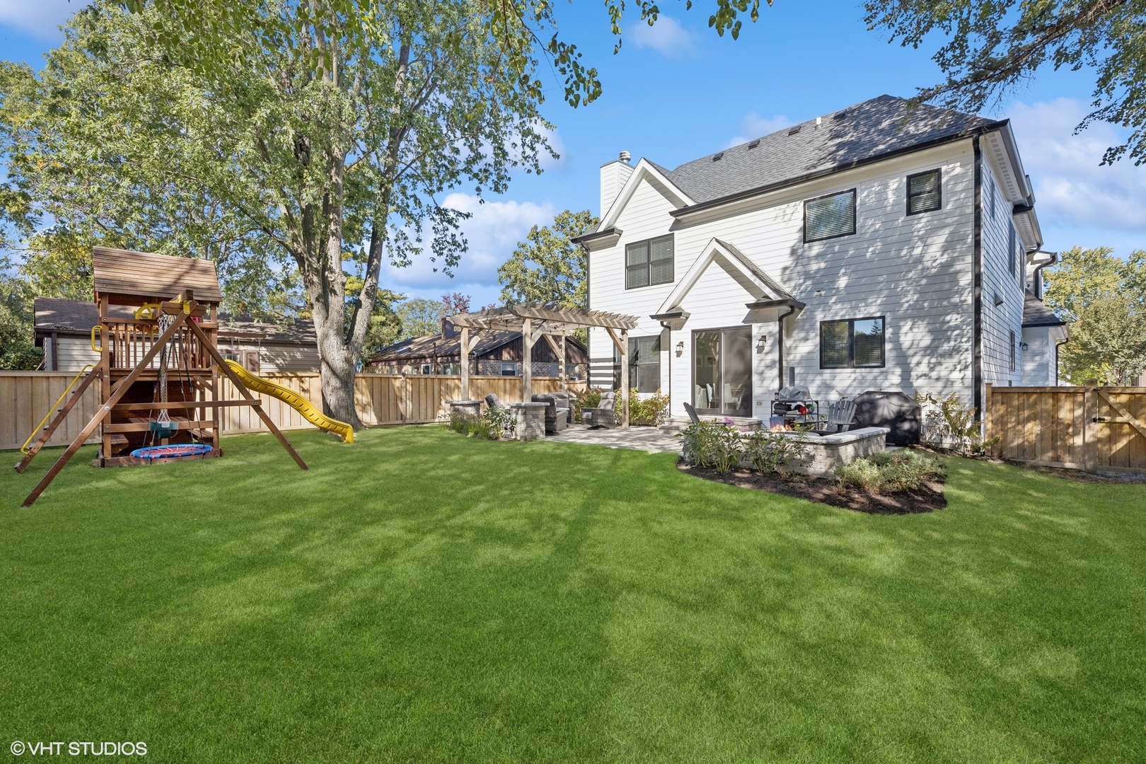 2425 Illinois Road Northbrook, IL 60062 - Photo 50 of 59 a view of a house with a back yard