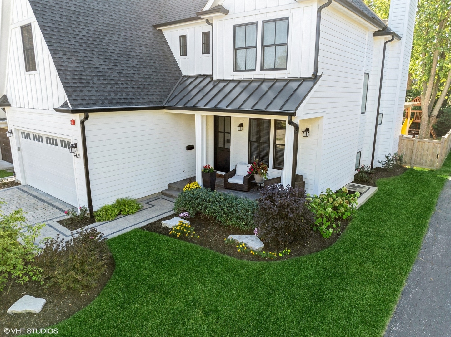 2425 Illinois Road Northbrook, IL 60062 - Photo 5 of 59 a view of a house with backyard and garden