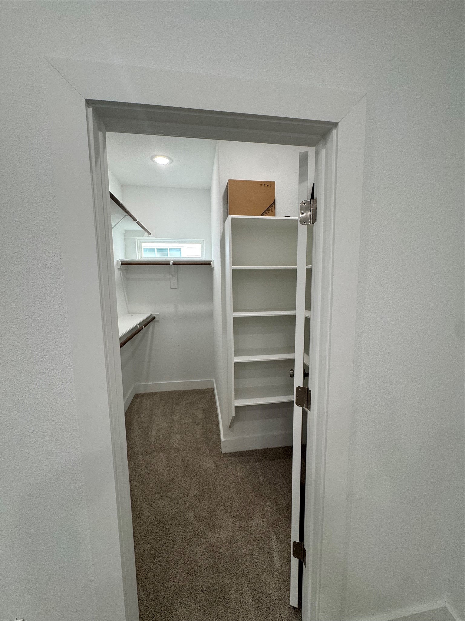 4604 Bricker Street, Unit A Houston, TX 77051 - Photo 10 of 15 a view of walk in closet with empty racks