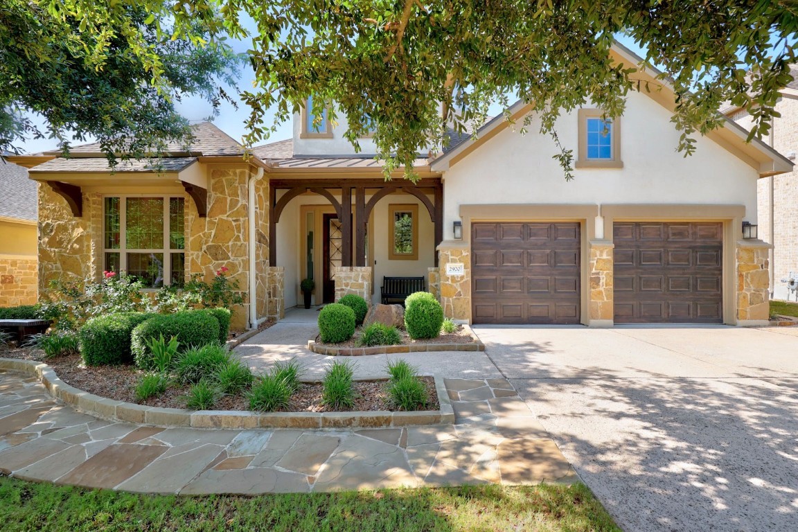 2920 Wedgescale Pass Leander, TX 78641 - Photo 1 of 1 a front view of a house with garden