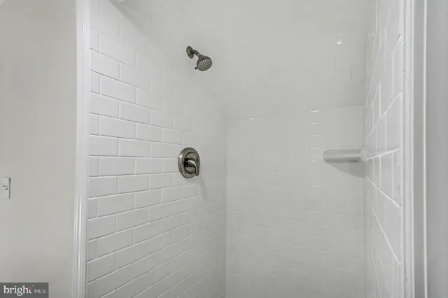 a view of a house with a door and wooden floor