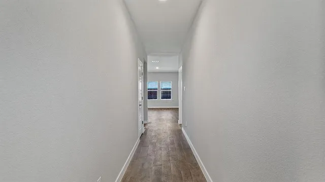 an empty room with closet area
