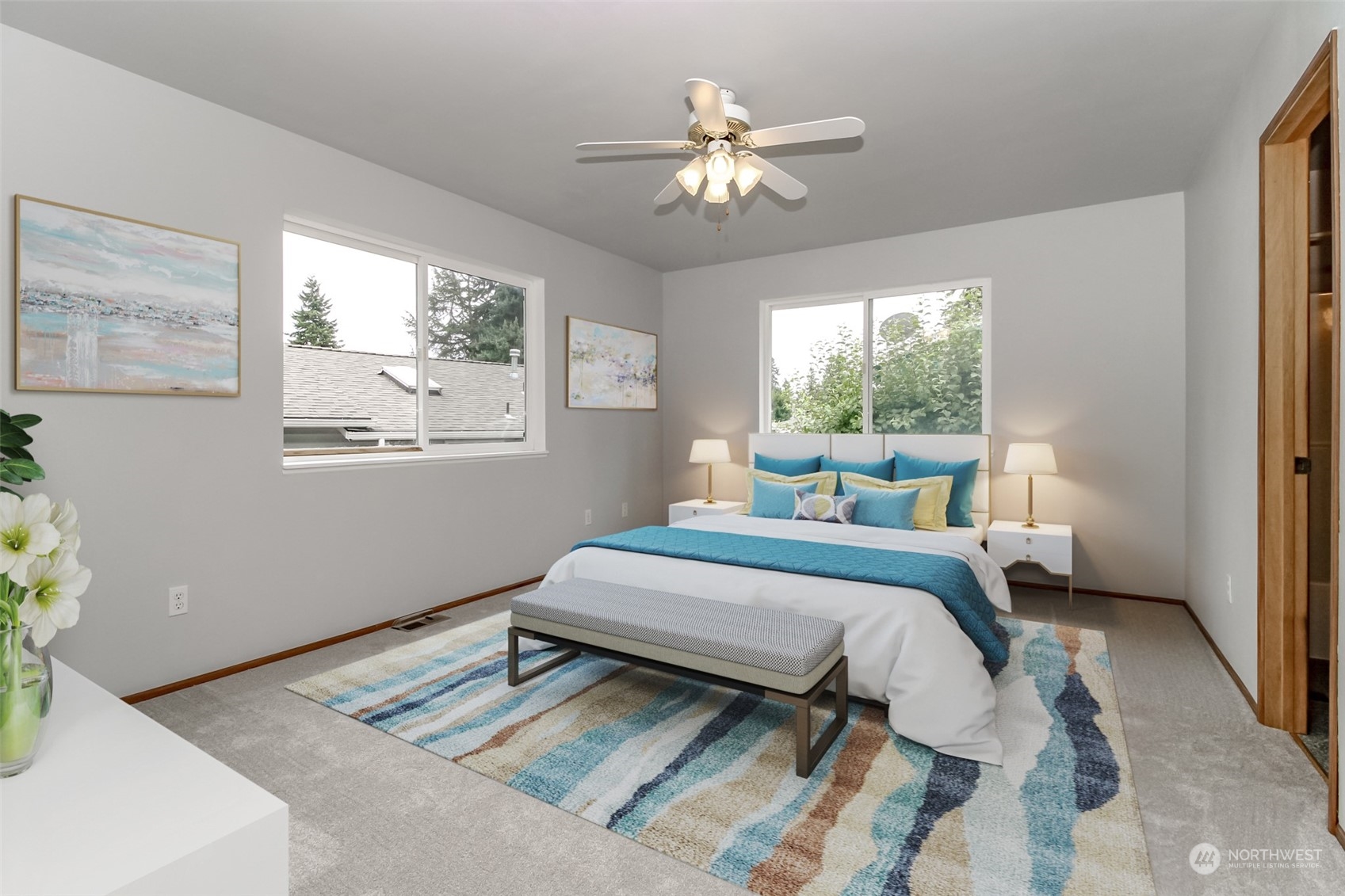 2401 Northeast 27th Street Renton, WA 98056 - Photo 12 of 24 a bedroom with a bed lamp and a window