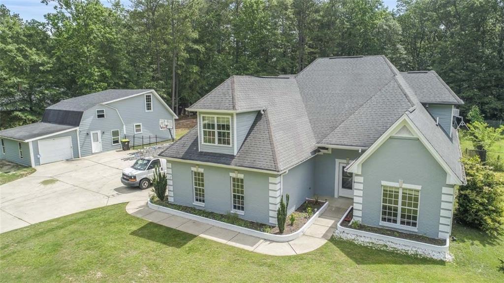 475 Pool Road Hiram, GA 30141 - Photo 1 of 1 a view of a house with a yard