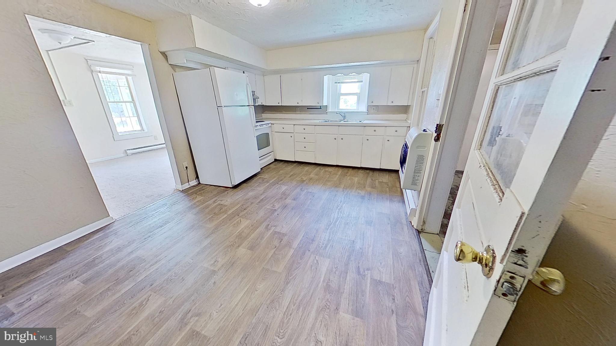 185 Burkholder Road Red Lion, PA 17356 - Photo 4 of 11 a room with window and wooden floor