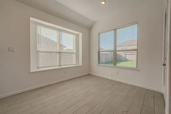 an empty room with windows