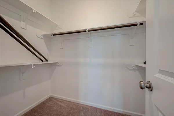 a view of small space with racks on the wall