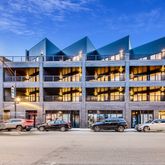 a cars parked in front of a building