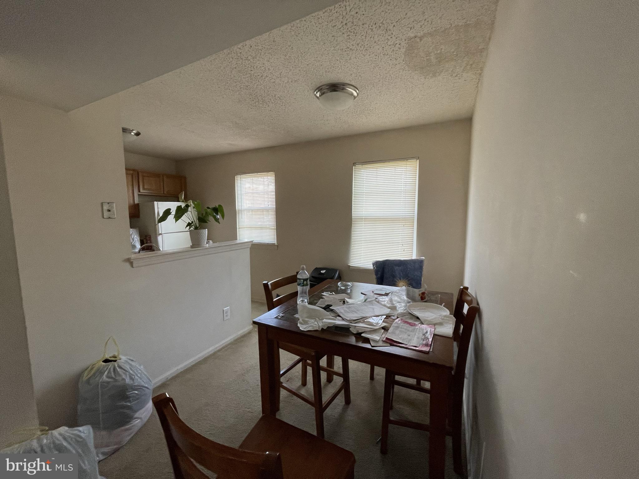 100 Park Boulevard, Unit 44D Cherry Hill, NJ 08034 - Photo 3 of 8 a view of a dining room with furniture