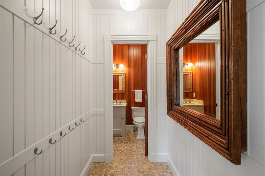 70 Old Farm Road Wellesley, MA 02481 - Photo 14 of 38 a view of a hallway with wooden floor and staircase