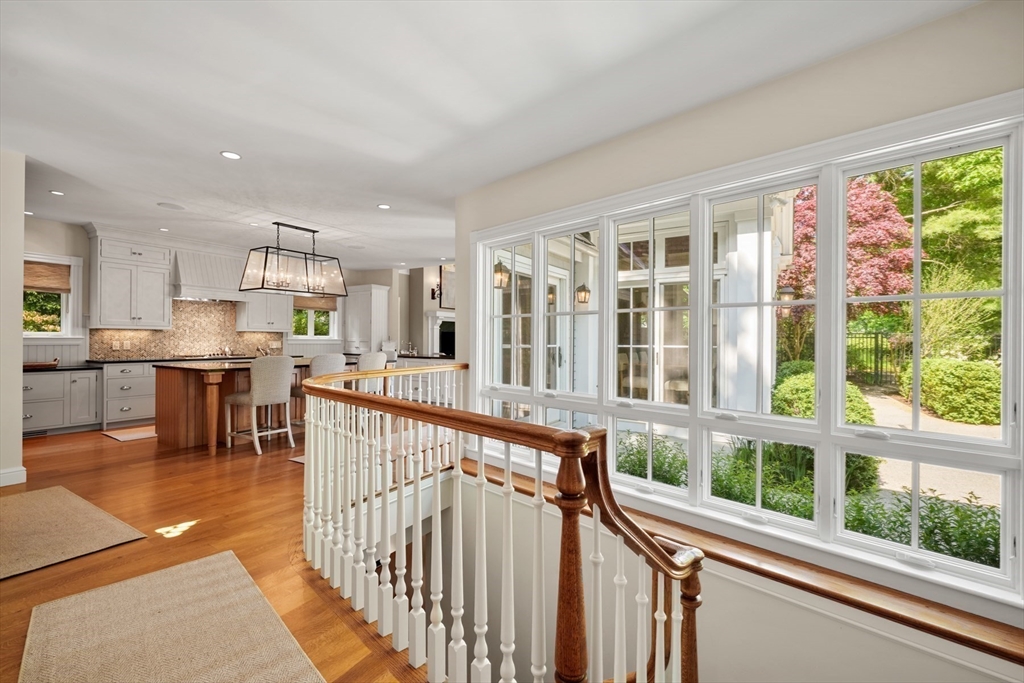 70 Old Farm Road Wellesley, MA 02481 - Photo 17 of 38 a view of a kitchen with dining table and windows