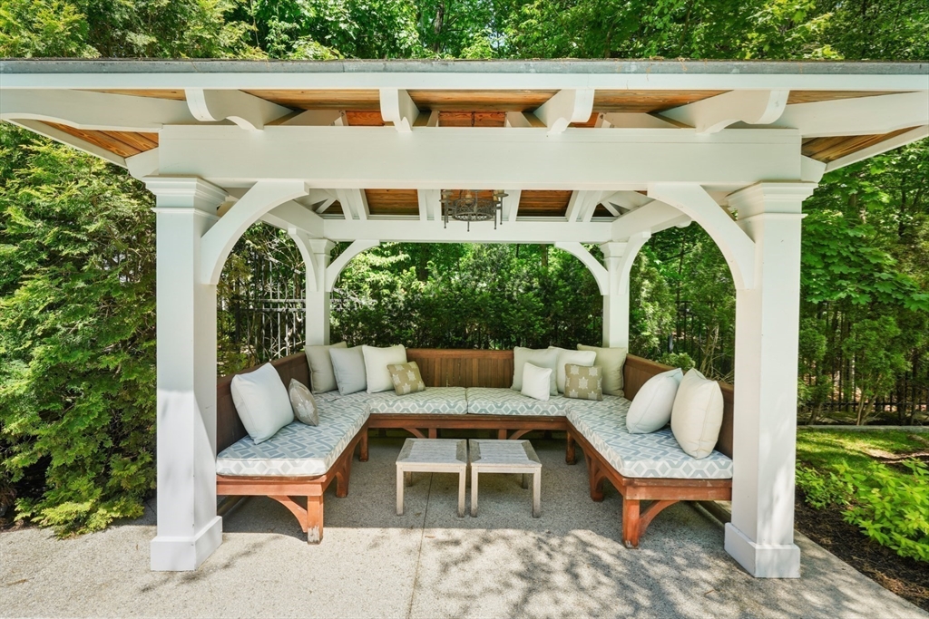 70 Old Farm Road Wellesley, MA 02481 - Photo 27 of 38 a view of a patio with two chairs and a table in a patio