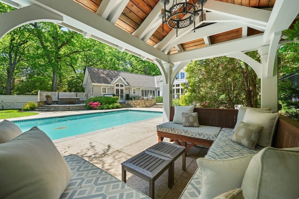 70 Old Farm Road Wellesley, MA 02481 - Photo 28 of 38 a view of a patio with couches chairs and a big yard