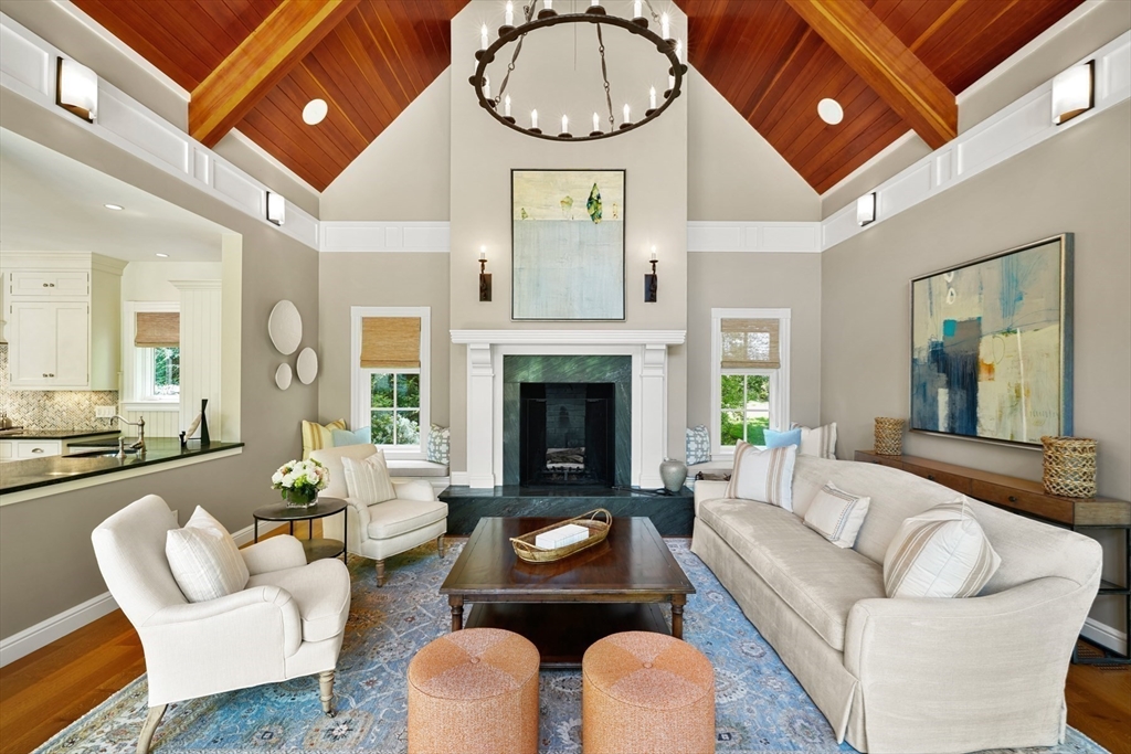 70 Old Farm Road Wellesley, MA 02481 - Photo 4 of 38 a living room with furniture a fireplace and a chandelier