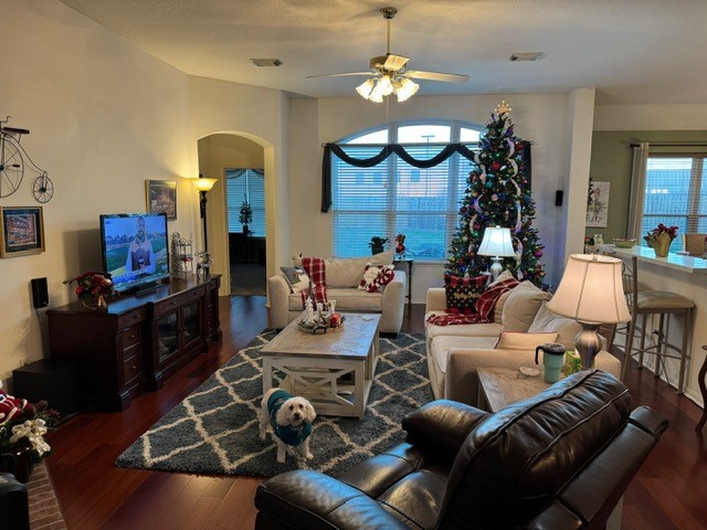 9918 Mossy Tree Lane Houston, TX 77064 - Photo 3 of 15 a living room with furniture kitchen view and a chandelier
