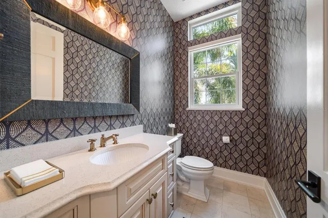 a spacious bedroom with a large bed and a couch