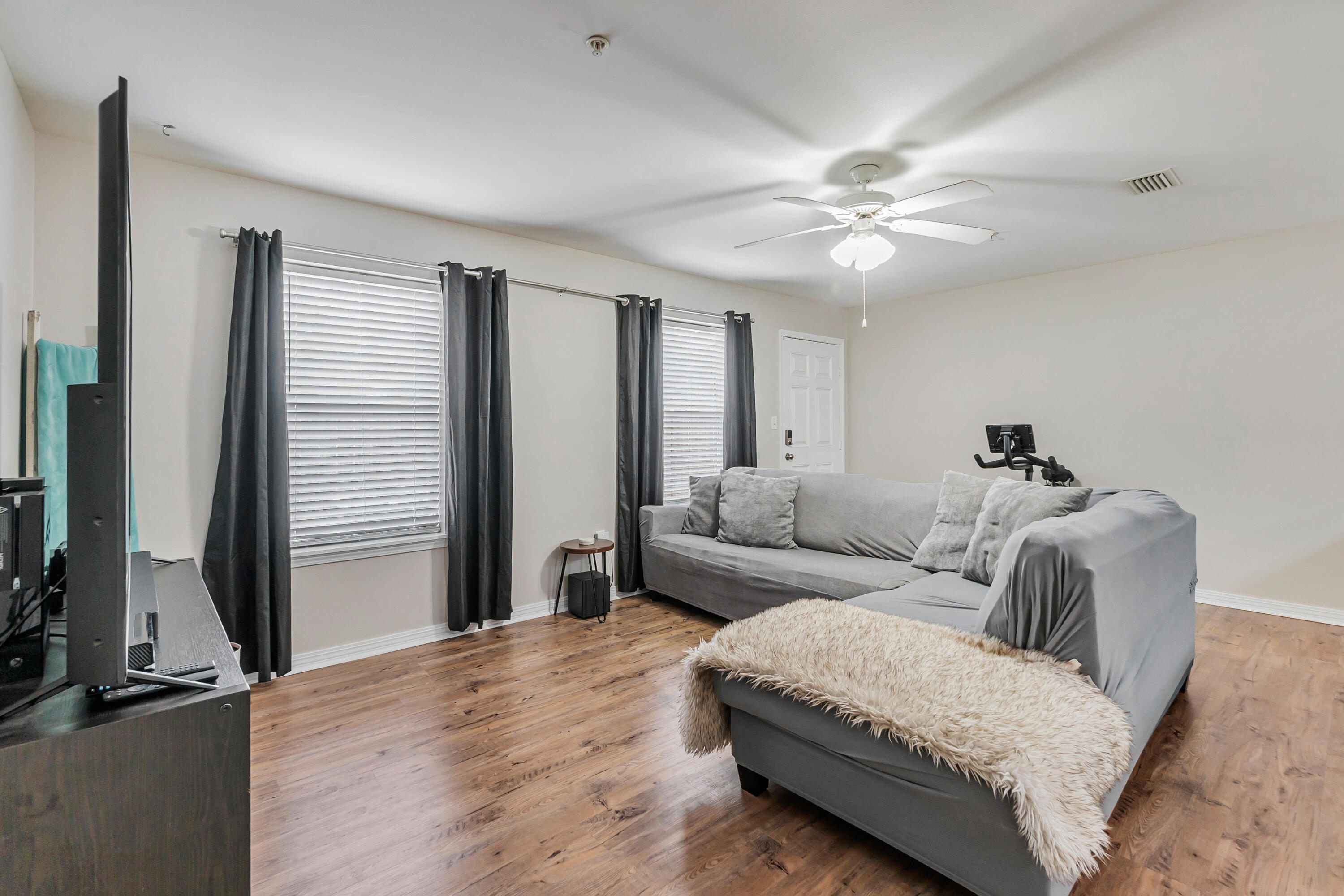 17 Southeast Shell Avenue, Unit C1 Fort Walton Beach, FL 32548 - Photo 4 of 24 a living room with furniture and a window