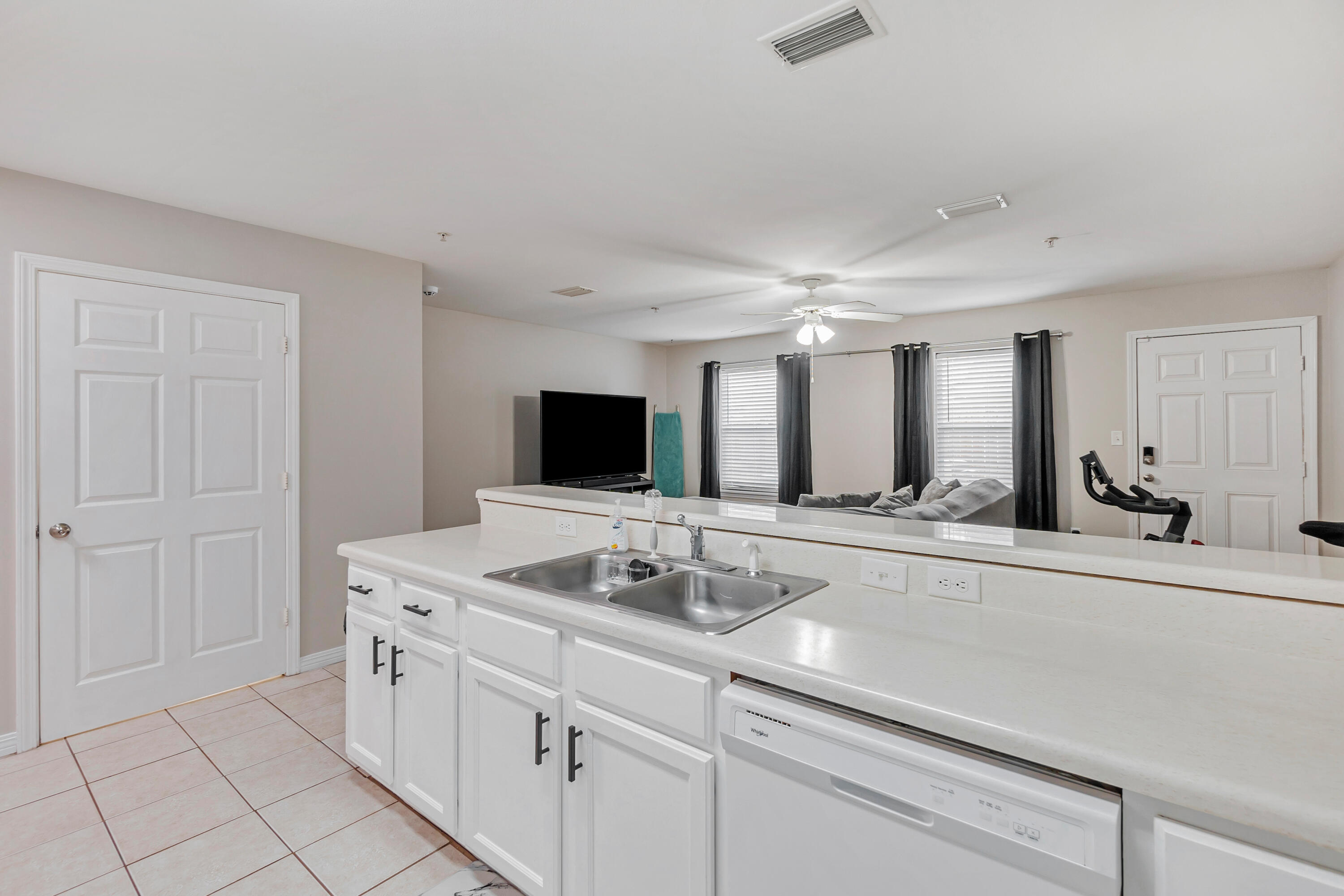 17 Southeast Shell Avenue, Unit C1 Fort Walton Beach, FL 32548 - Photo 9 of 24 a spacious bathroom with a sink and a mirror