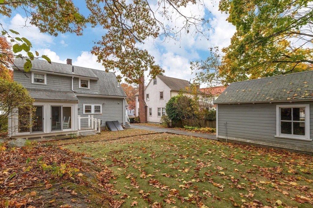 103 Madison Street Dedham, MA 02026 - Photo 19 of 21 a front view of a house with large trees