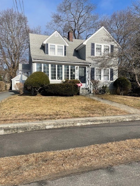 103 Madison Street Dedham, MA 02026 - Photo 20 of 21 a front view of a house with a yard