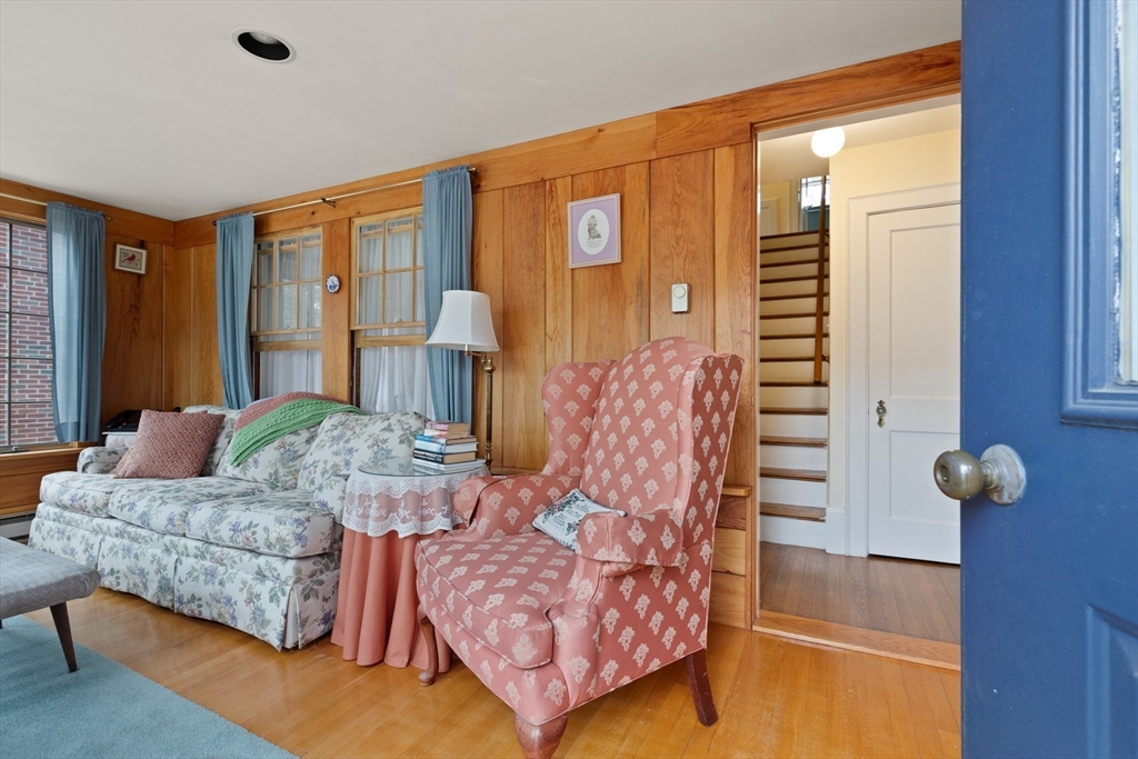 103 Madison Street Dedham, MA 02026 - Photo 2 of 21 a living room with furniture and a window