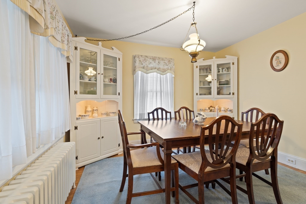 103 Madison Street Dedham, MA 02026 - Photo 7 of 21 a dining room with furniture and window