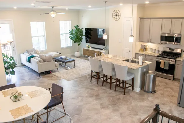 a view of kitchen with dining table and chairs