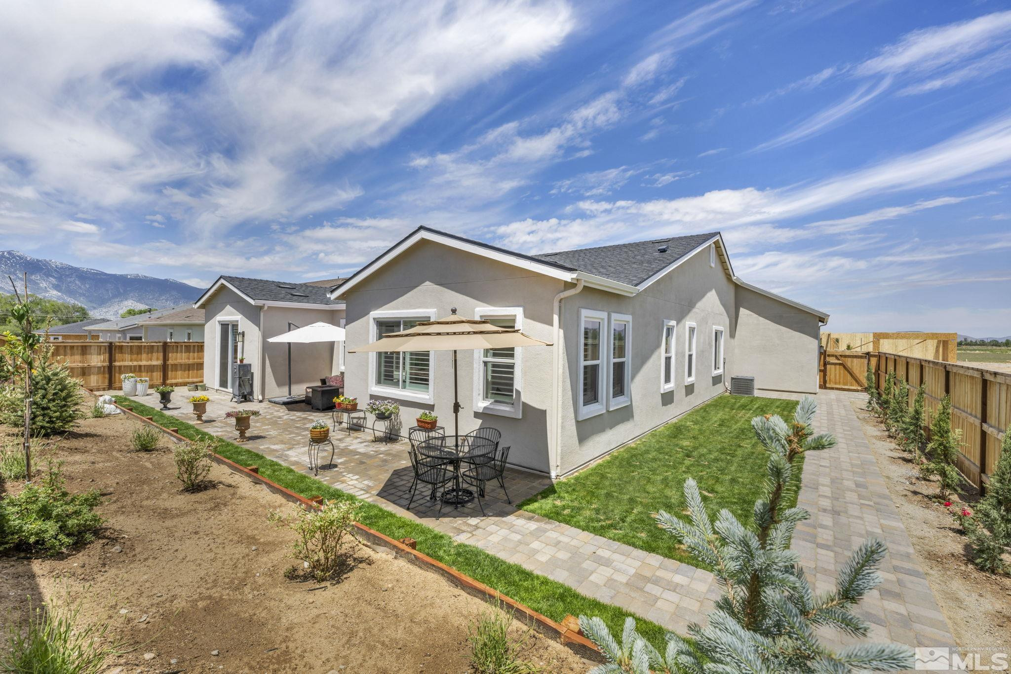 615 Sage Grouse Loop Stateline, NV 89449 - Photo 33 of 40 a front view of a house with garden