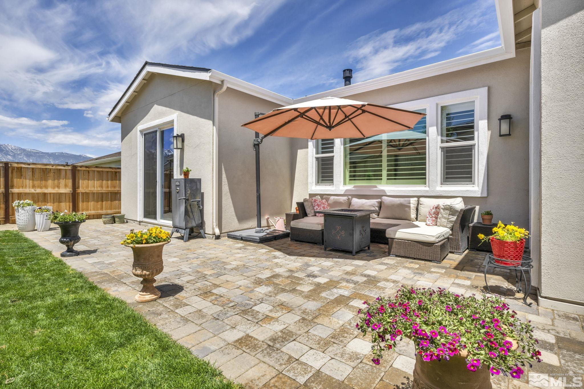 615 Sage Grouse Loop Stateline, NV 89449 - Photo 36 of 40 a view of a house with sitting area and garden