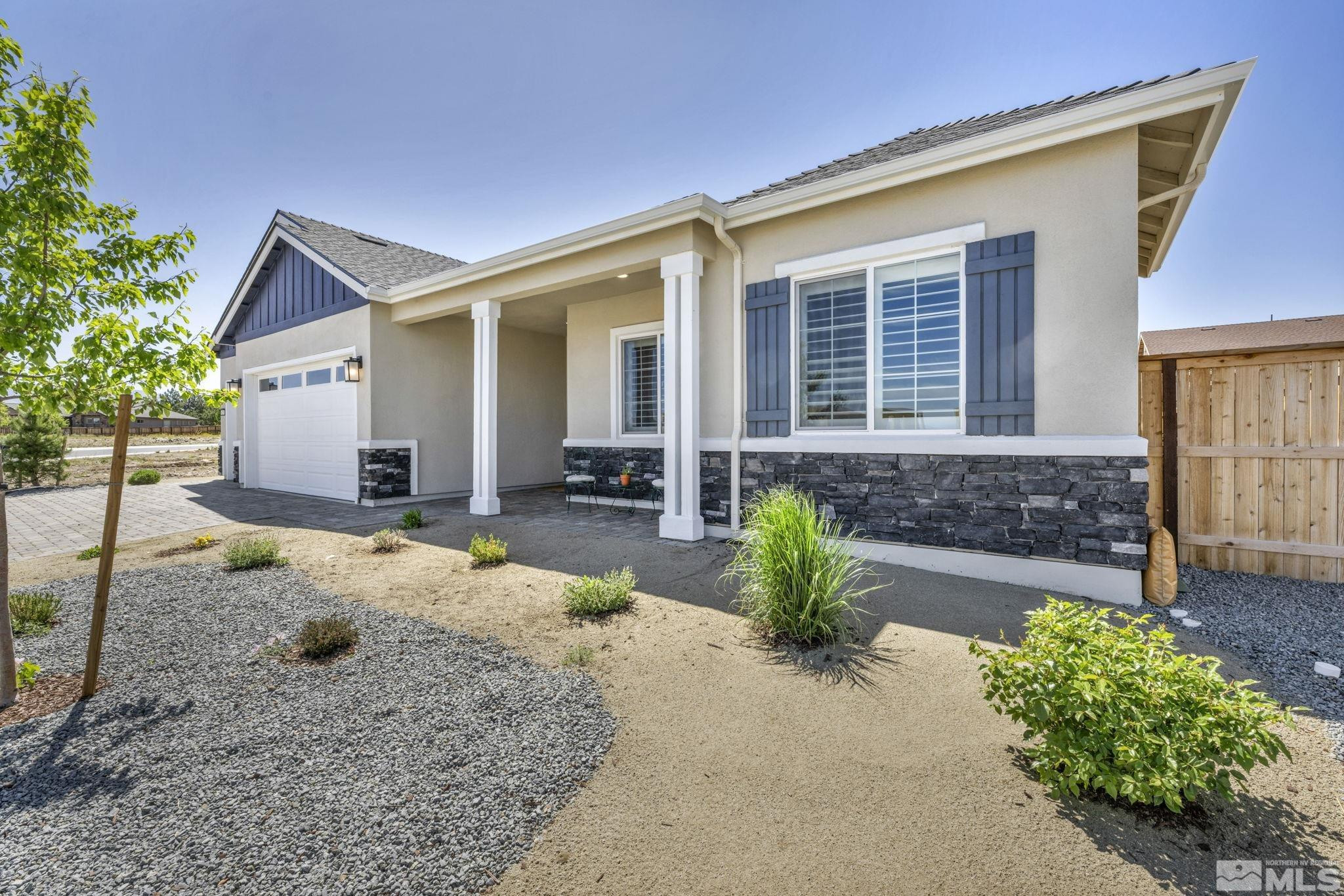 615 Sage Grouse Loop Stateline, NV 89449 - Photo 40 of 40 front view of a house with a yard