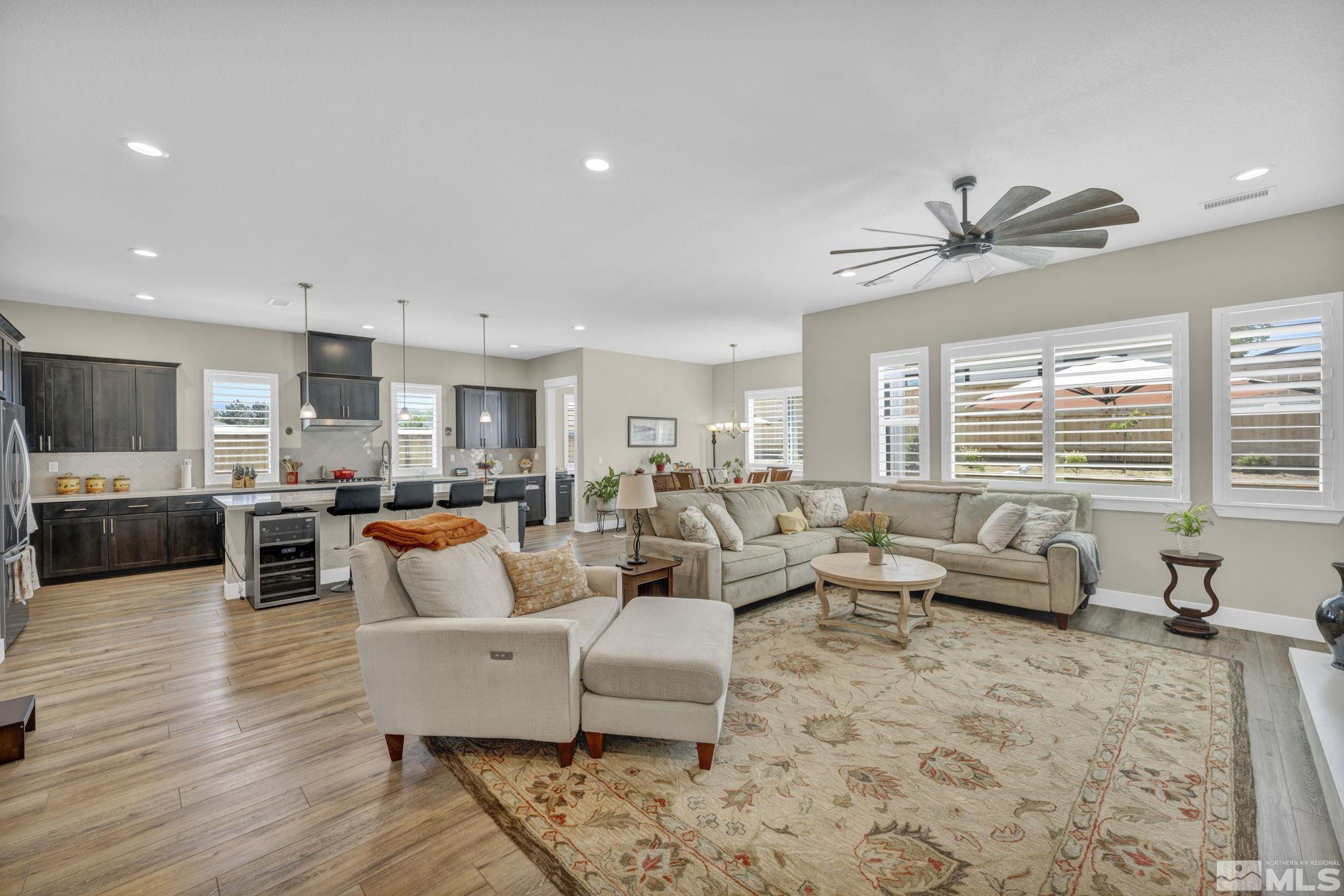 615 Sage Grouse Loop Stateline, NV 89449 - Photo 4 of 40 a living room with furniture kitchen view and a large window
