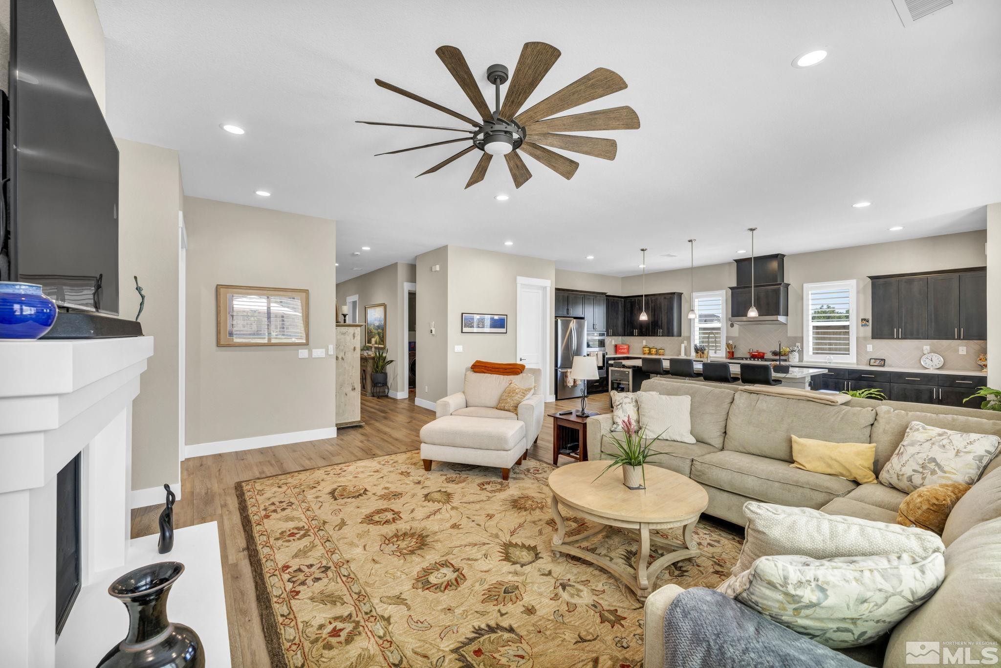 615 Sage Grouse Loop Stateline, NV 89449 - Photo 6 of 40 a living room with furniture and kitchen view