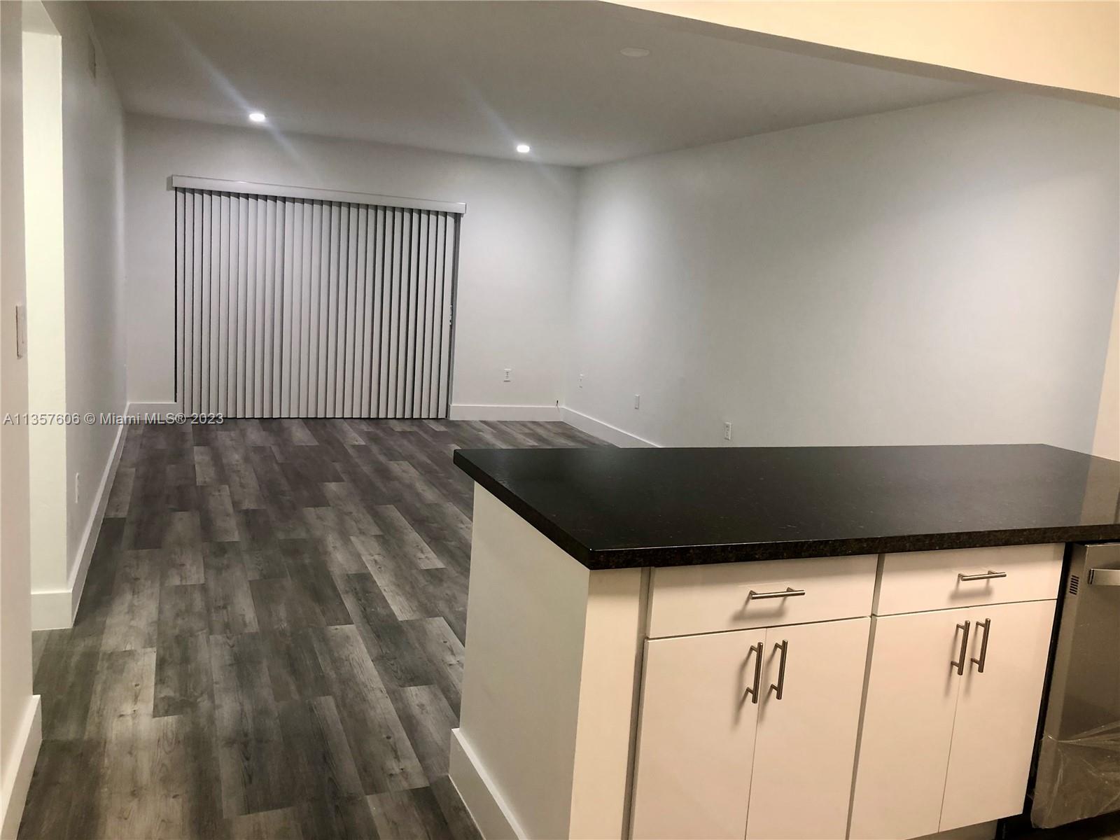 Hialeah Hialeah, FL 33012 - Photo 5 of 7 a view of wooden floor