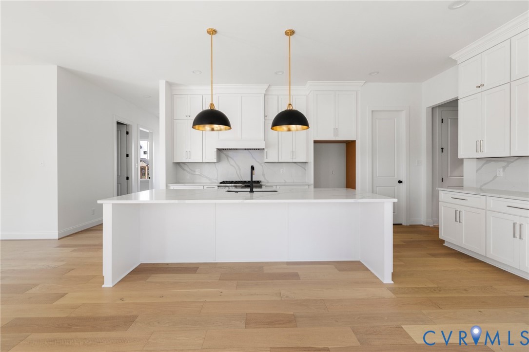 4624 Lake Summer Loop Moseley, VA 23120 - Photo 19 of 36 a view living room with stainless steel appliances kitchen island granite countertop furniture and a view of living room