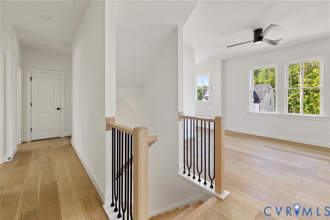 4624 Lake Summer Loop Moseley, VA 23120 - Photo 25 of 36 a view of a hallway with wooden floor and windows