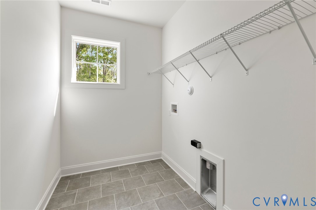 4624 Lake Summer Loop Moseley, VA 23120 - Photo 31 of 36 an empty room with a white wall and a window