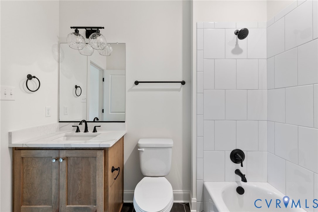 4624 Lake Summer Loop Moseley, VA 23120 - Photo 33 of 36 a bathroom with a sink toilet and shower