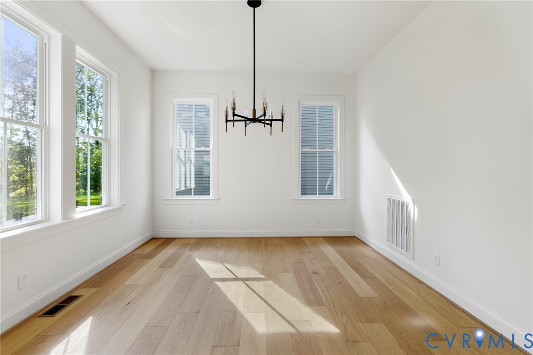4624 Lake Summer Loop Moseley, VA 23120 - Photo 10 of 36 a view of an empty room with a window