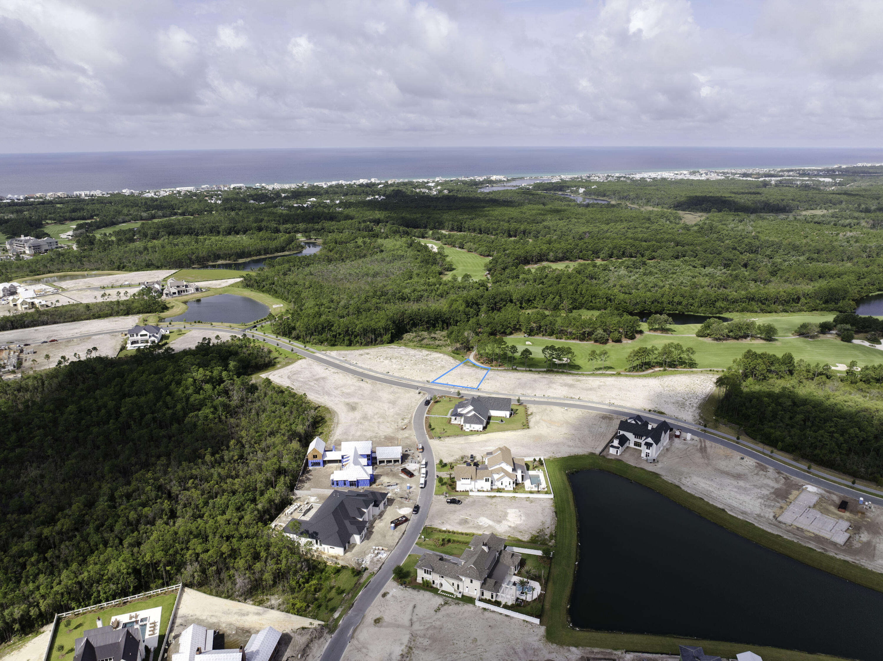 Lot 79 Windsong Dr Inlet Beach Inlet Beach, FL 32461 - Photo 7 of 8 an aerial view of residential houses with outdoor space and river