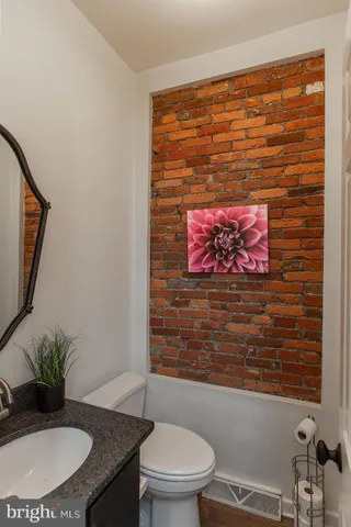 a view of staircase with wooden floor
