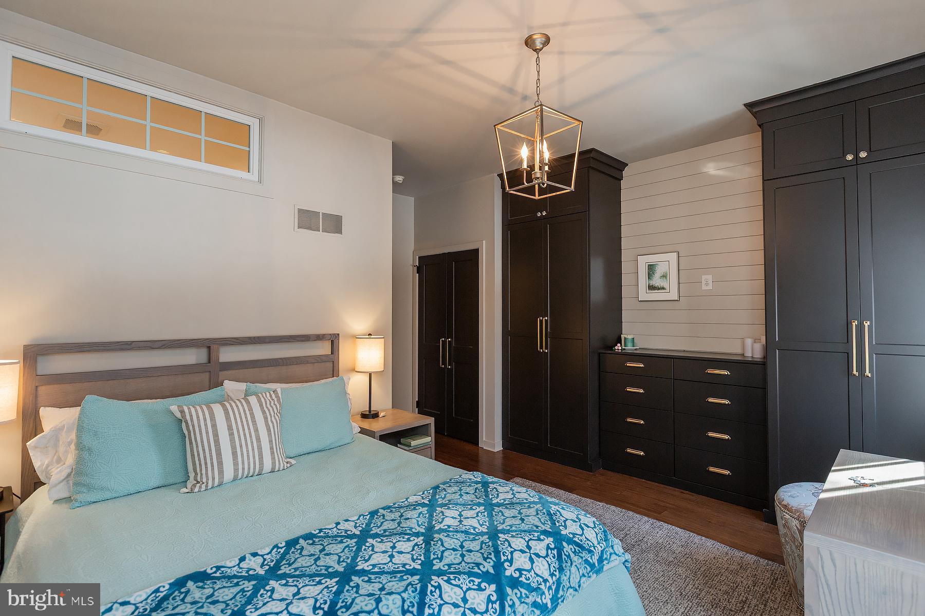 139 South Duke Street Lancaster, PA 17602 - Photo 19 of 43 a bedroom with a bed and a dresser