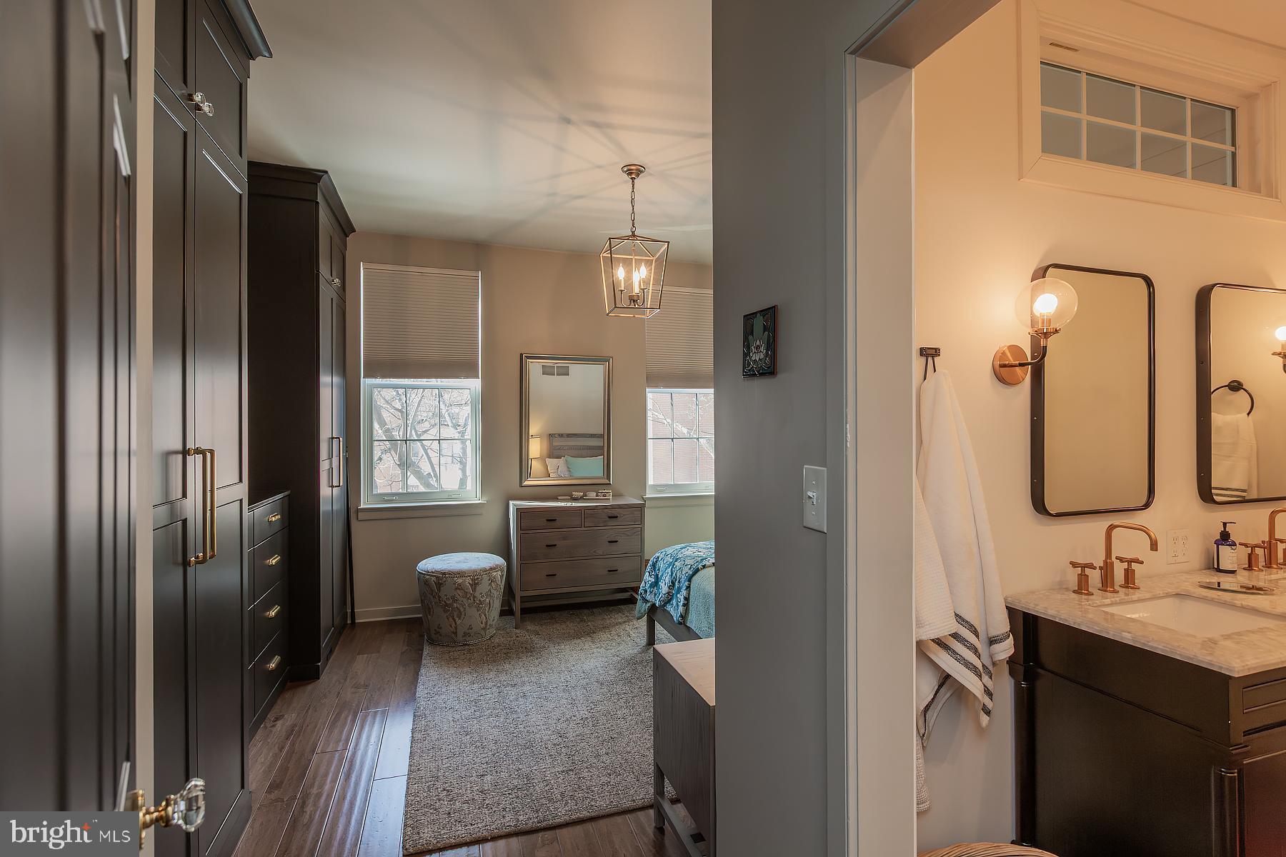 139 South Duke Street Lancaster, PA 17602 - Photo 21 of 43 a en suite bathroom with a sink a mirror and a shower