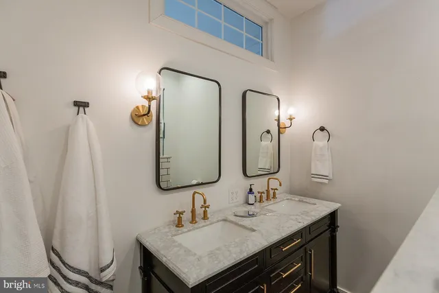a view of a workspace with bookshelf